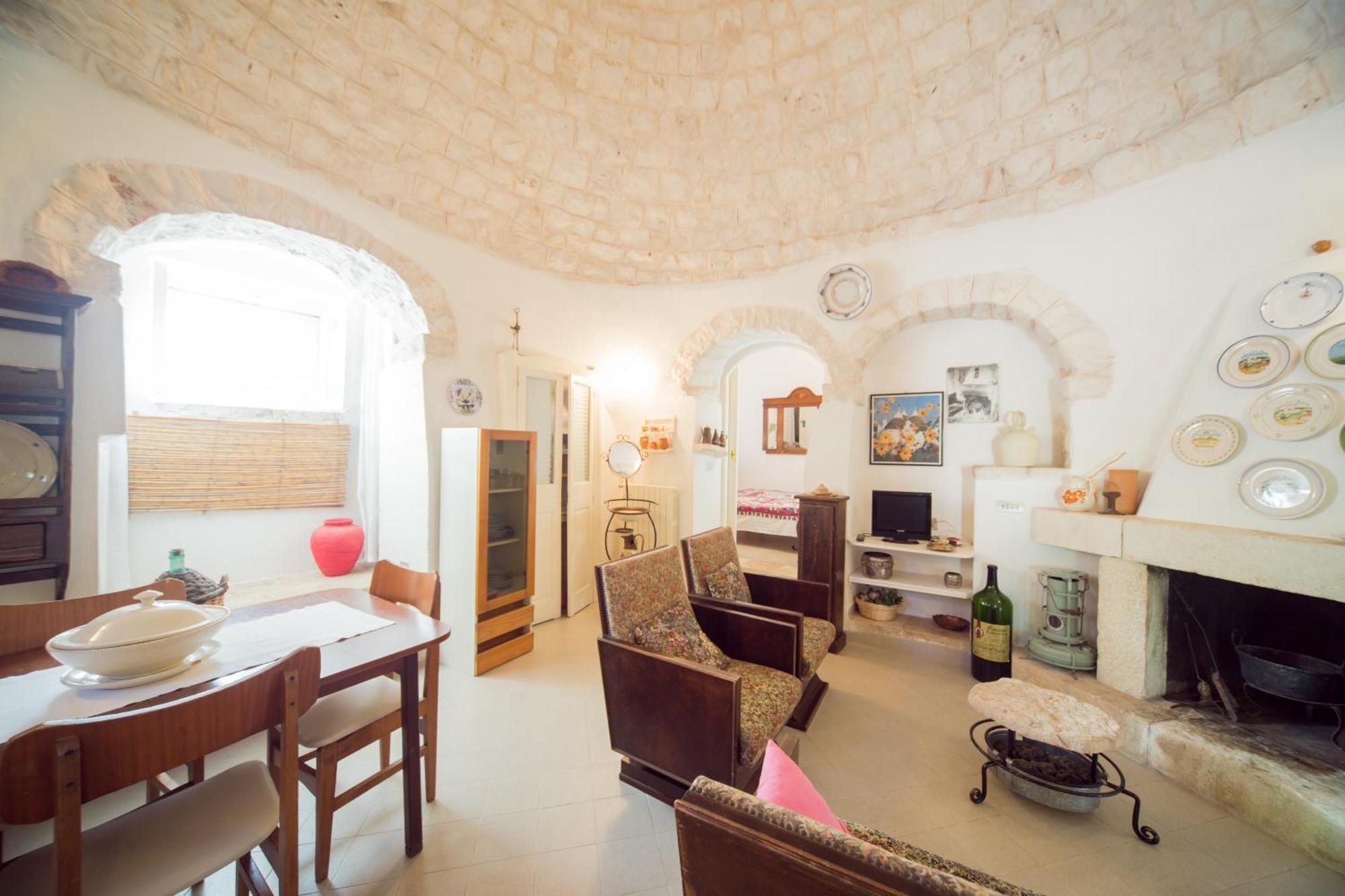 Trulli Girasoli E Viole Cocolicchio الغرفة الصورة